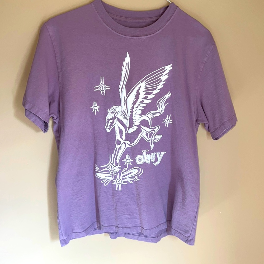 a purple unicorn obey shirt